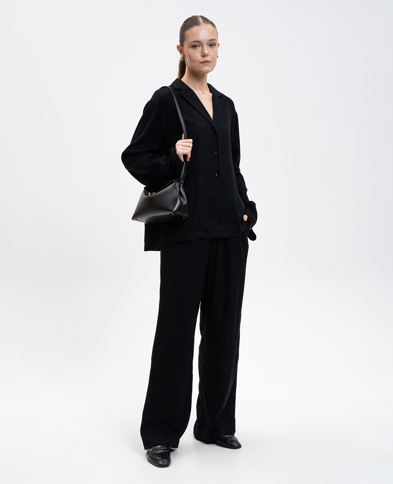 

Black shirt with embroidered monogram logo Toteme