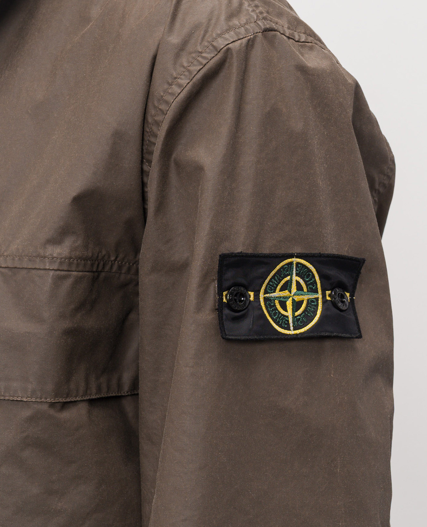 

Brown jacket with logo patch Stone Island
