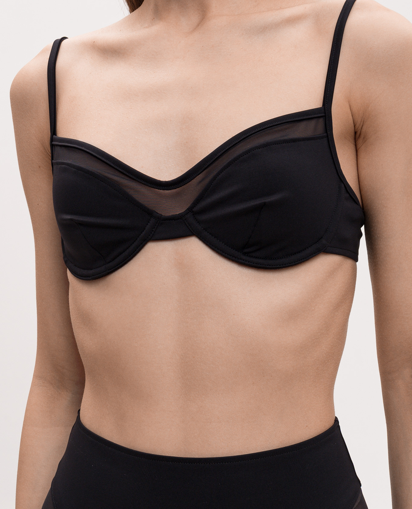 

Black swimsuit top Wolford