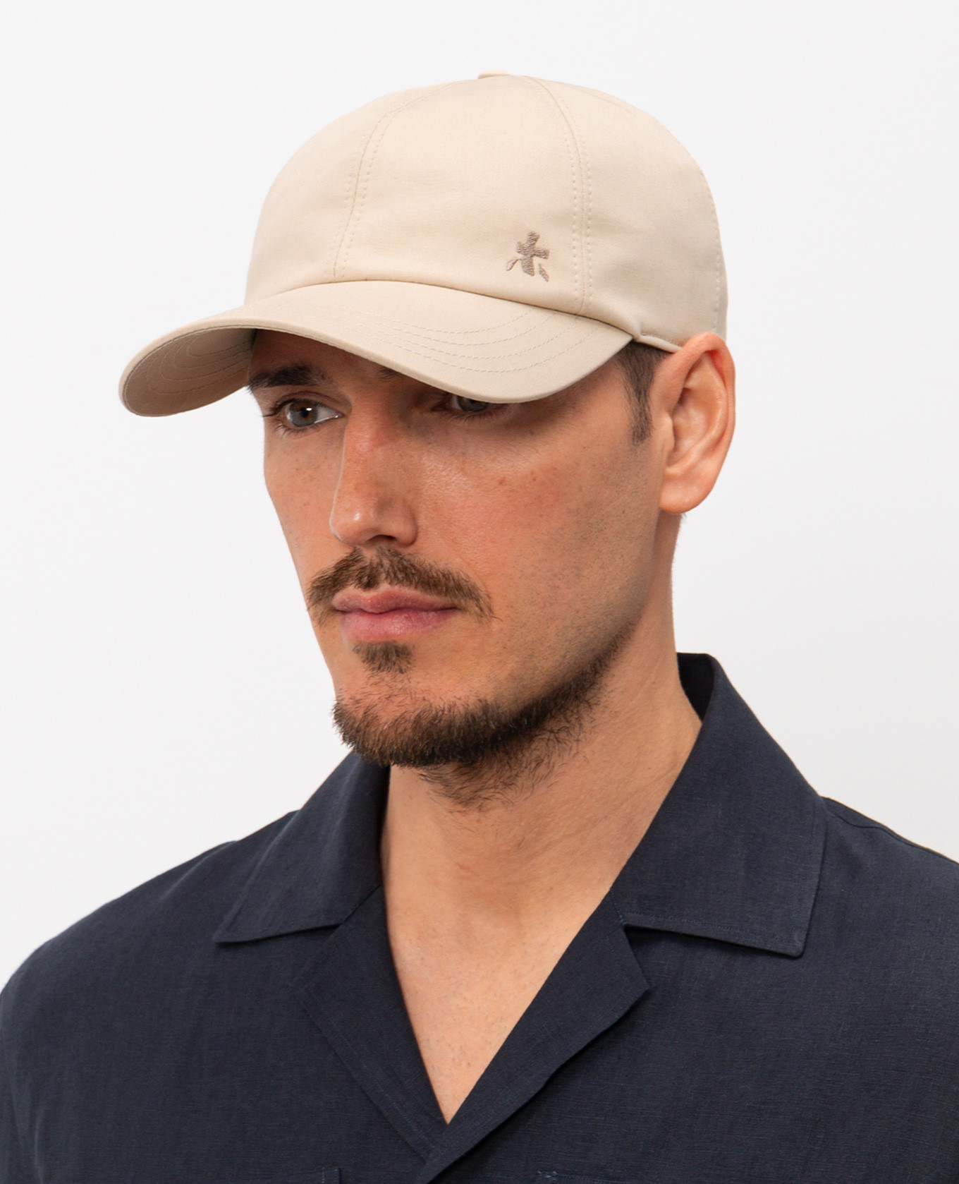 

Beige cap with embroidered emblem Premiata