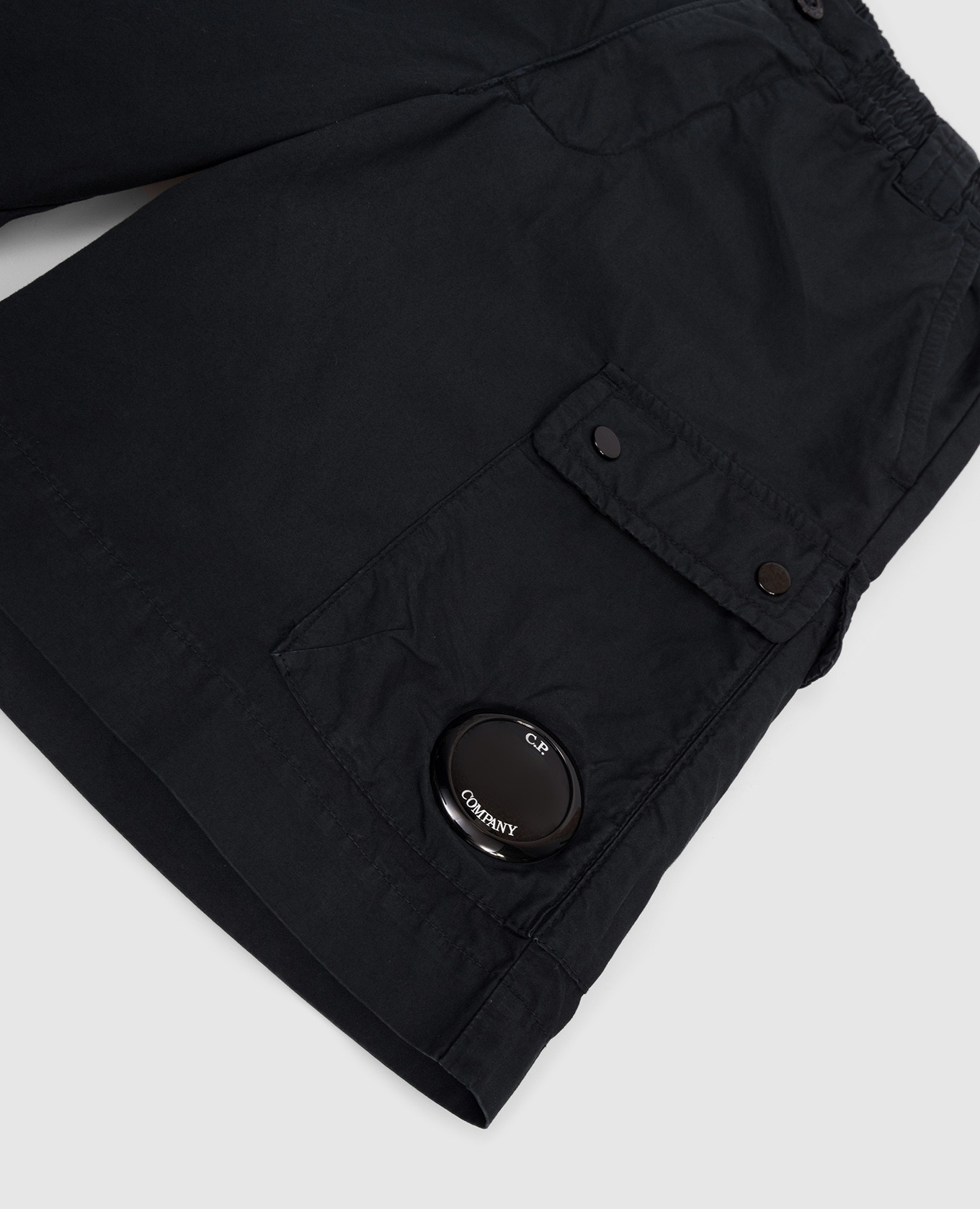 

Children's blue shorts with logo patch C.P. Company