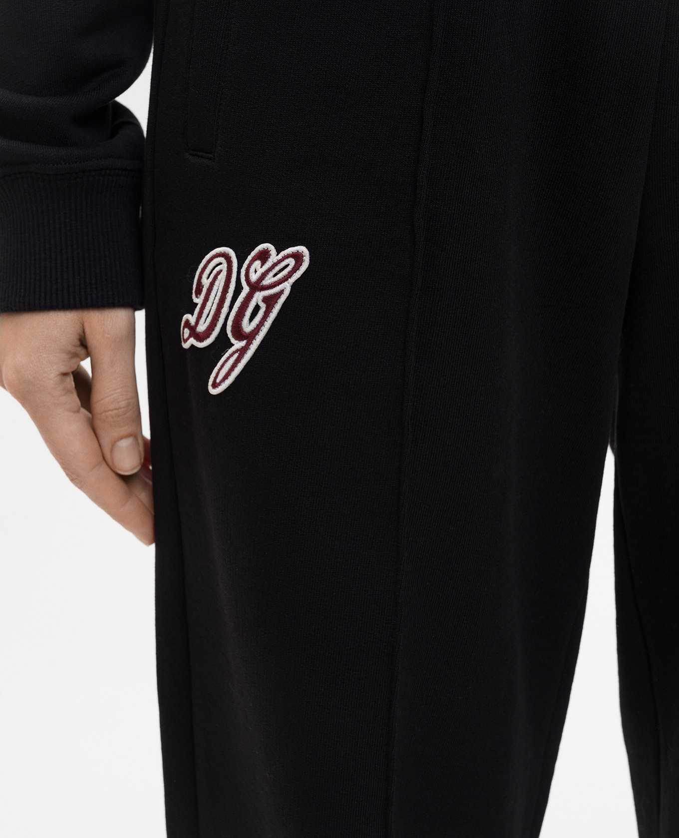 

Black sweatpants with textured monogram logo patch Dolce&Gabbana