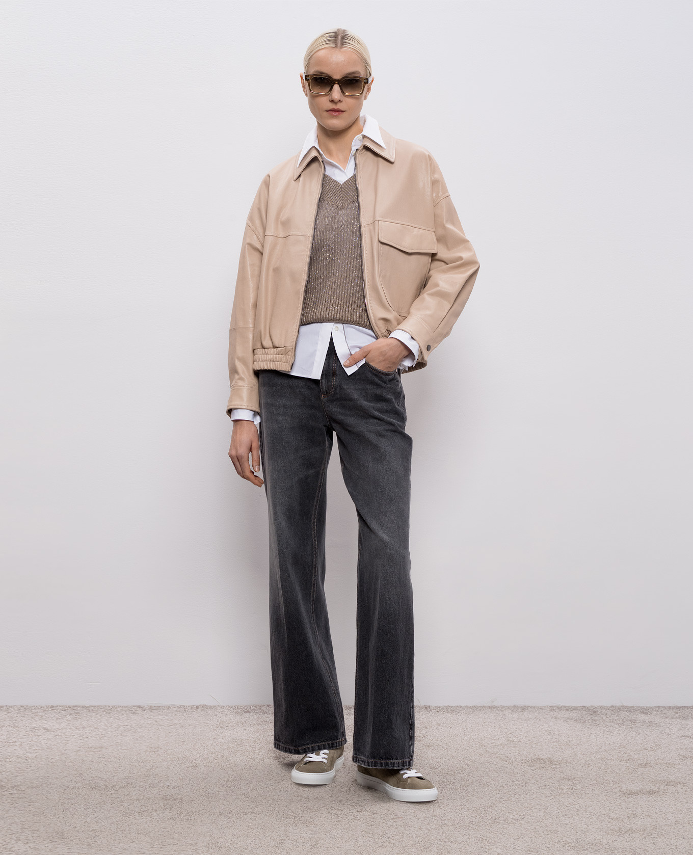 

Black flared jeans with a distressed effect Brunello Cucinelli