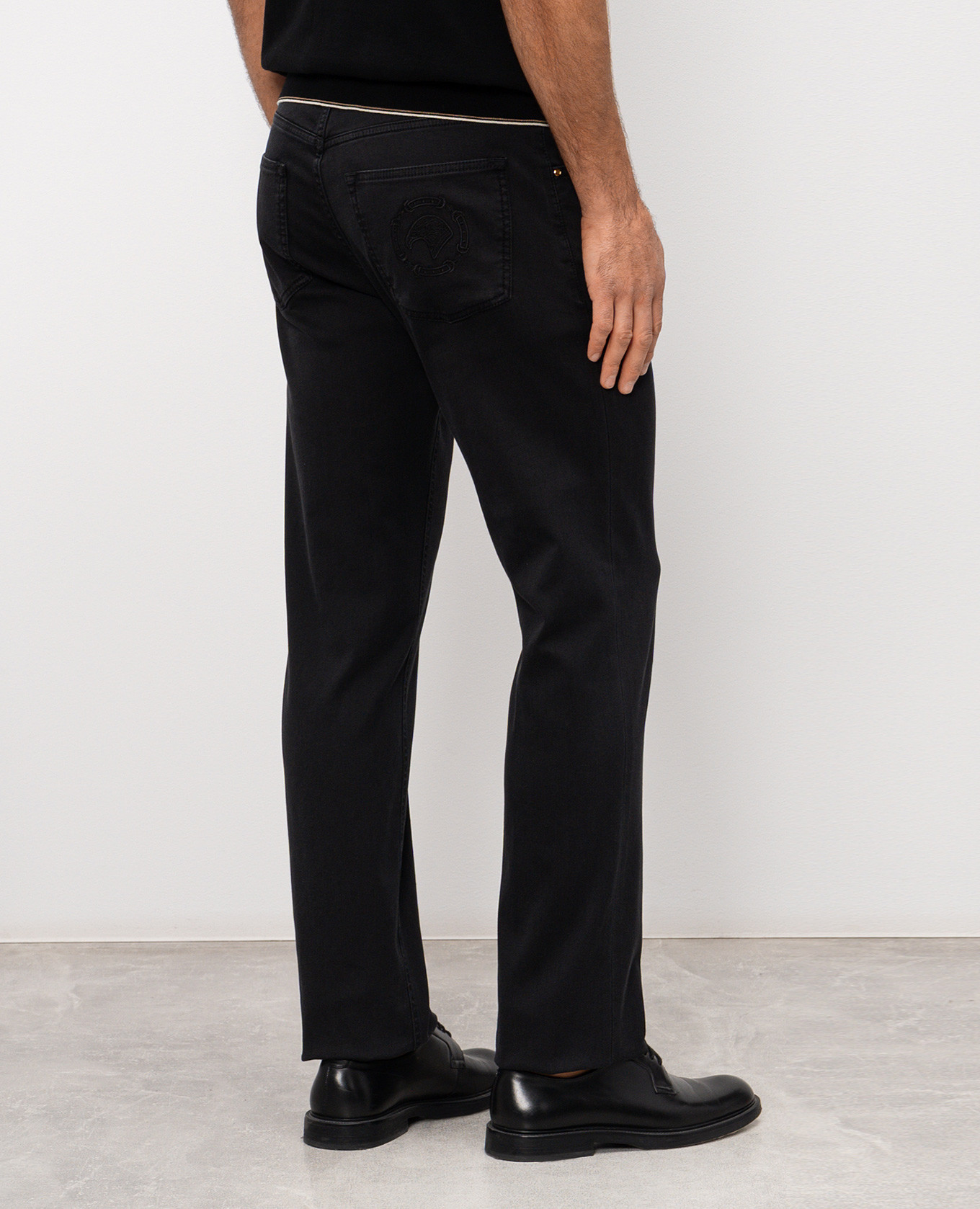 

Black jeans with leather logo patch Stefano Ricci