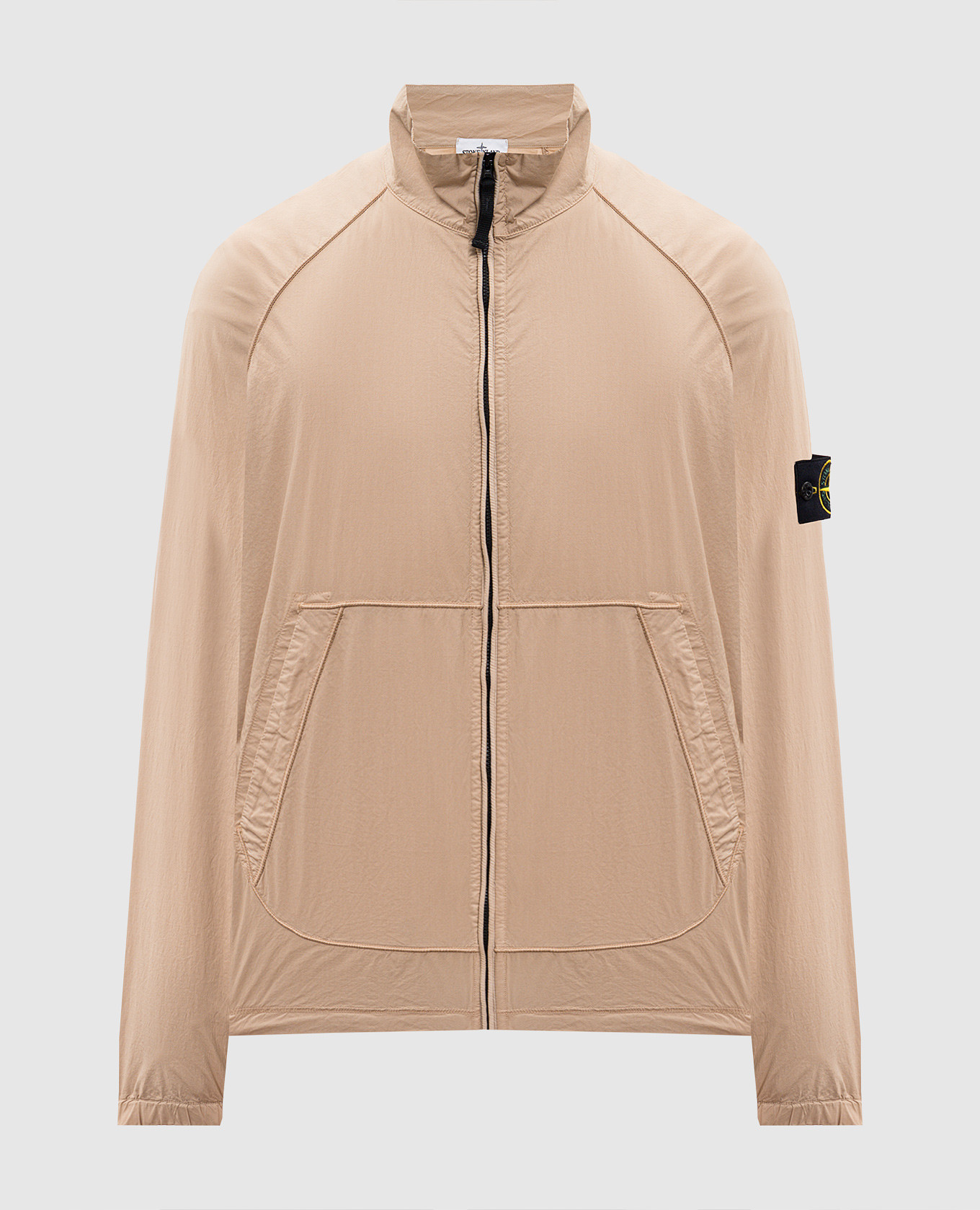Beige jacket with logo patch
