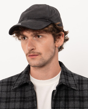 Vetements Black cap with logo embroidery UE76CA324Bm