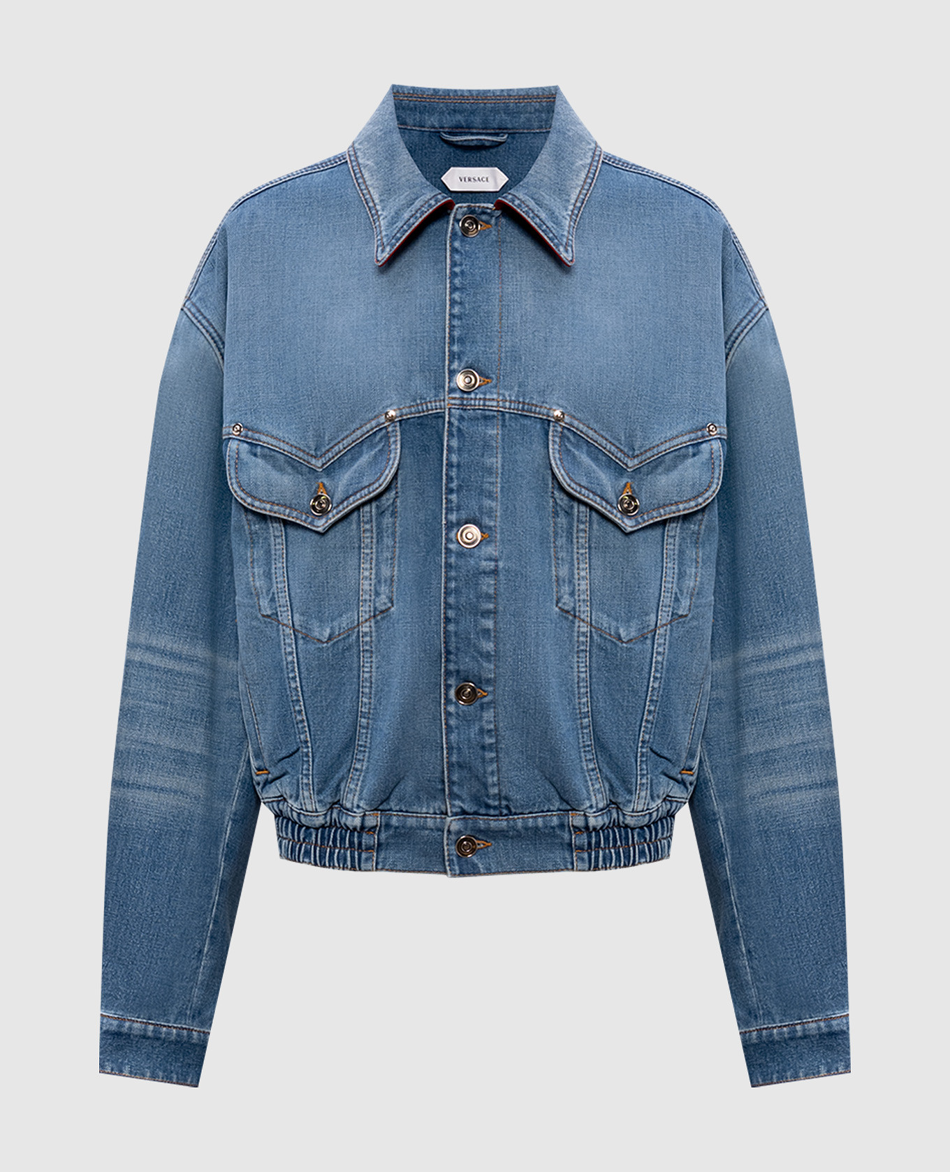 

Blue denim jacket with a worn effect Versace