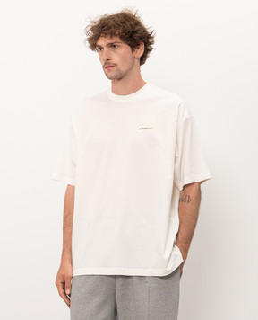 Vetements Ivory T-shirt with logo print MH27TR148Wm