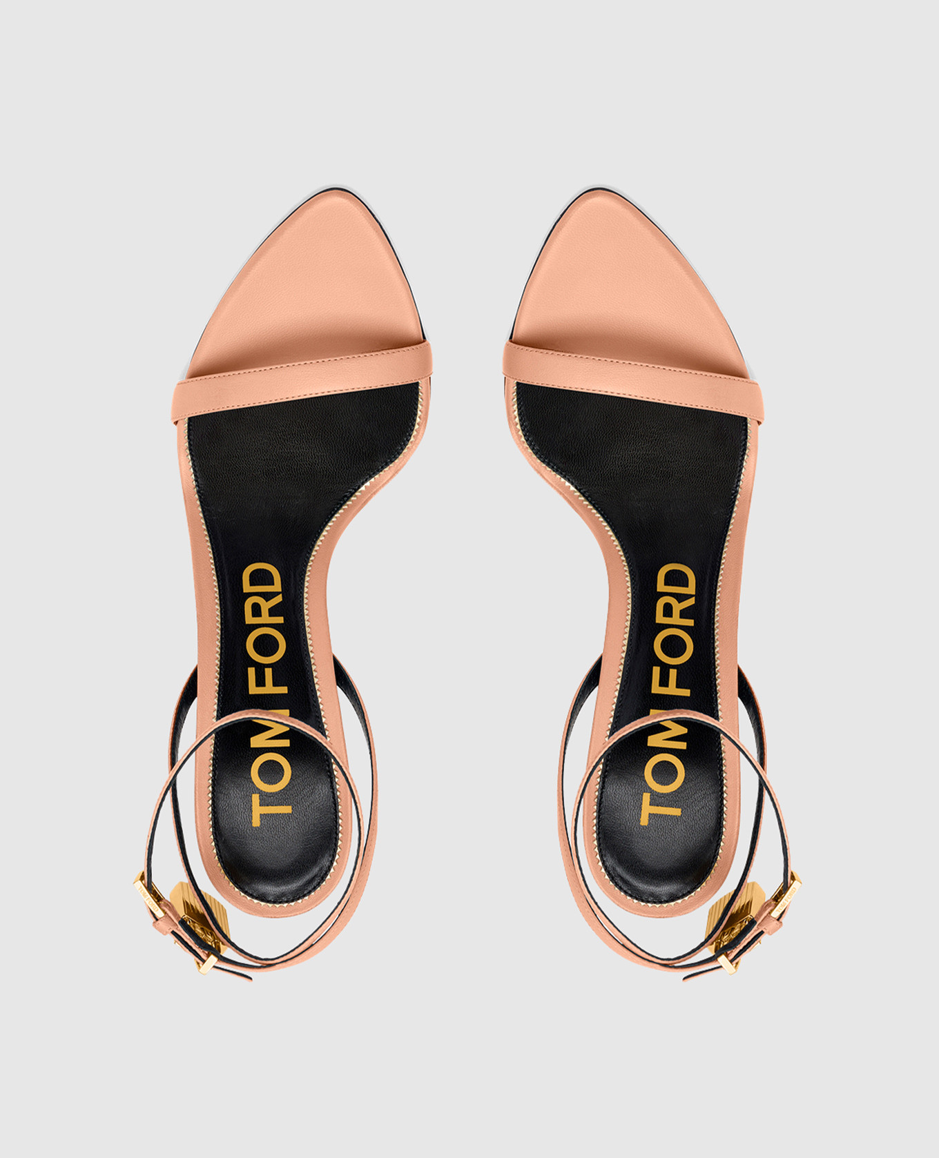 

Beige leather sandals with a pendant Tom Ford