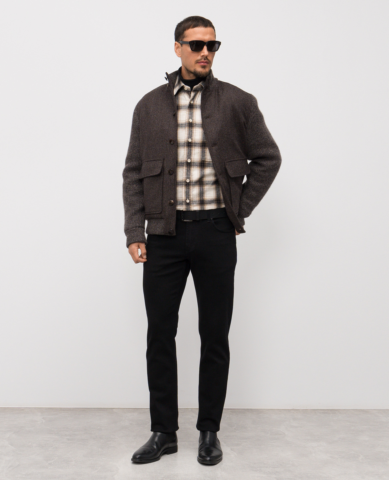 

Black jeans with logo patch Enrico Mandelli