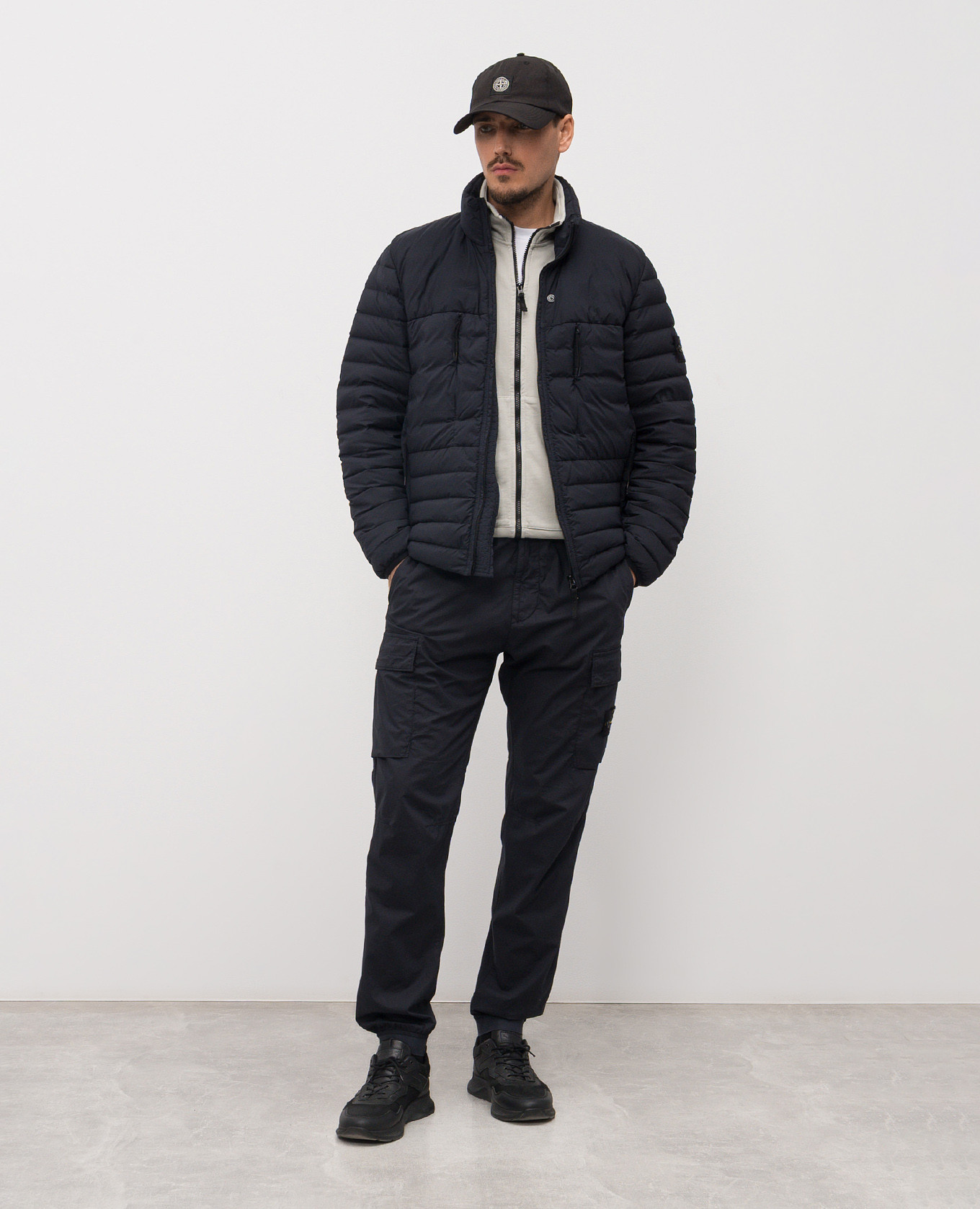 

Blue quilted down jacket with logo Stone Island