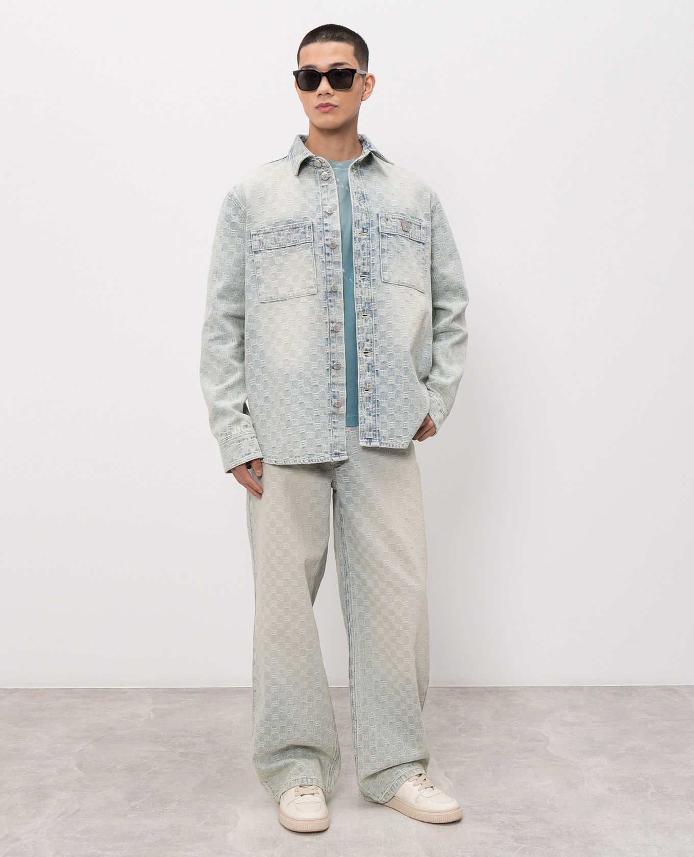 

Blue jeans with a monogram pattern Misbhv, Light blue