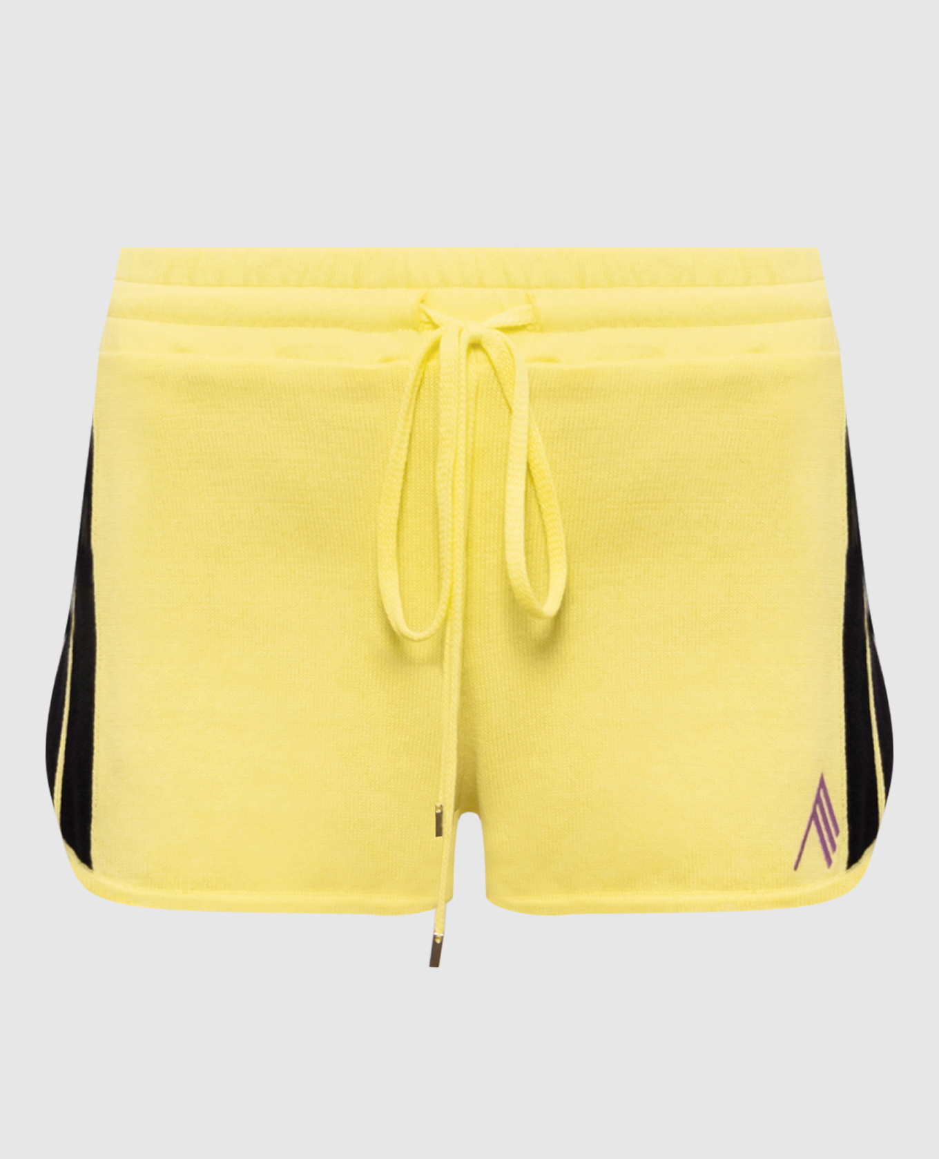 Short jaune avec emblème brodé