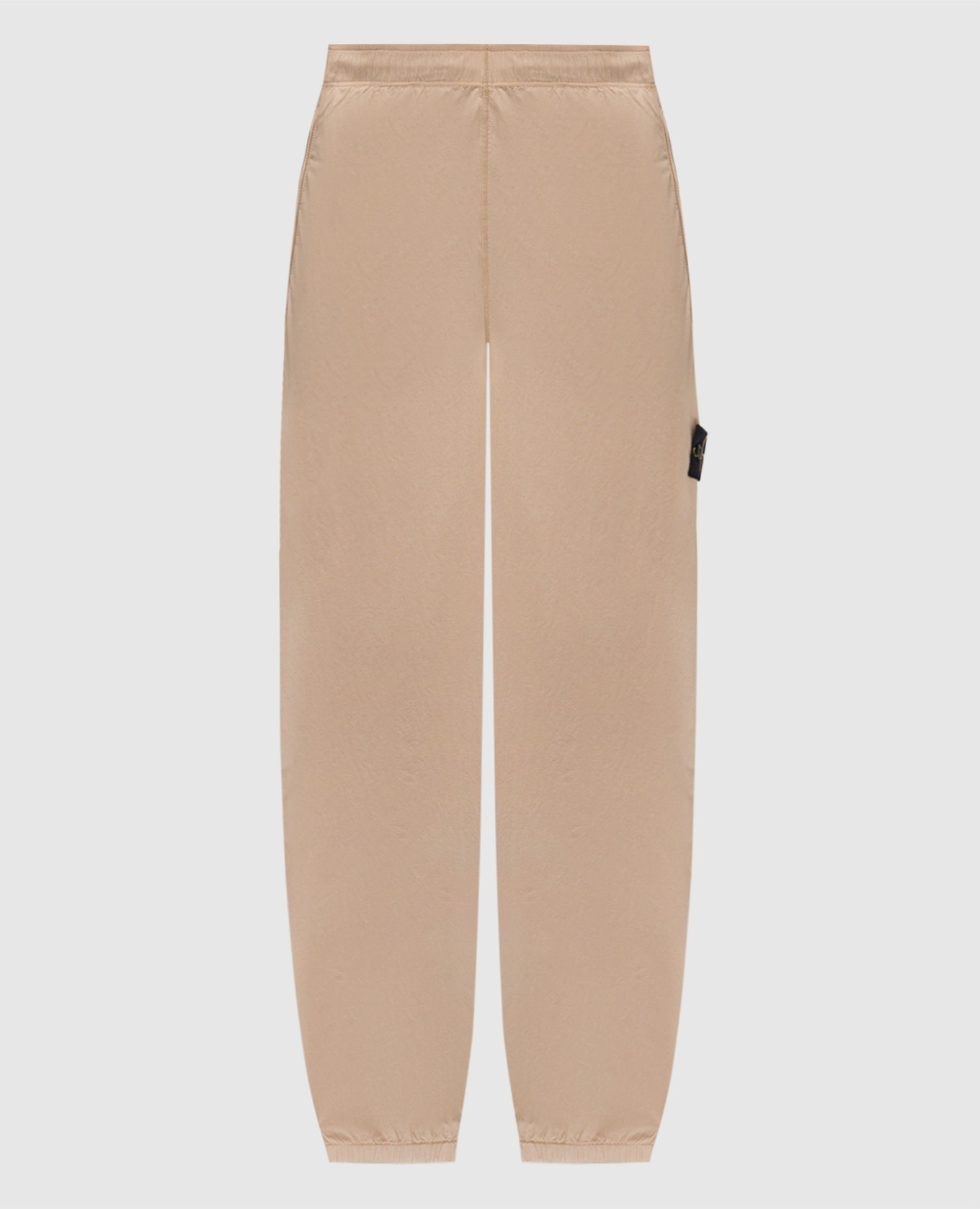 

Beige joggers with logo patch Stone Island