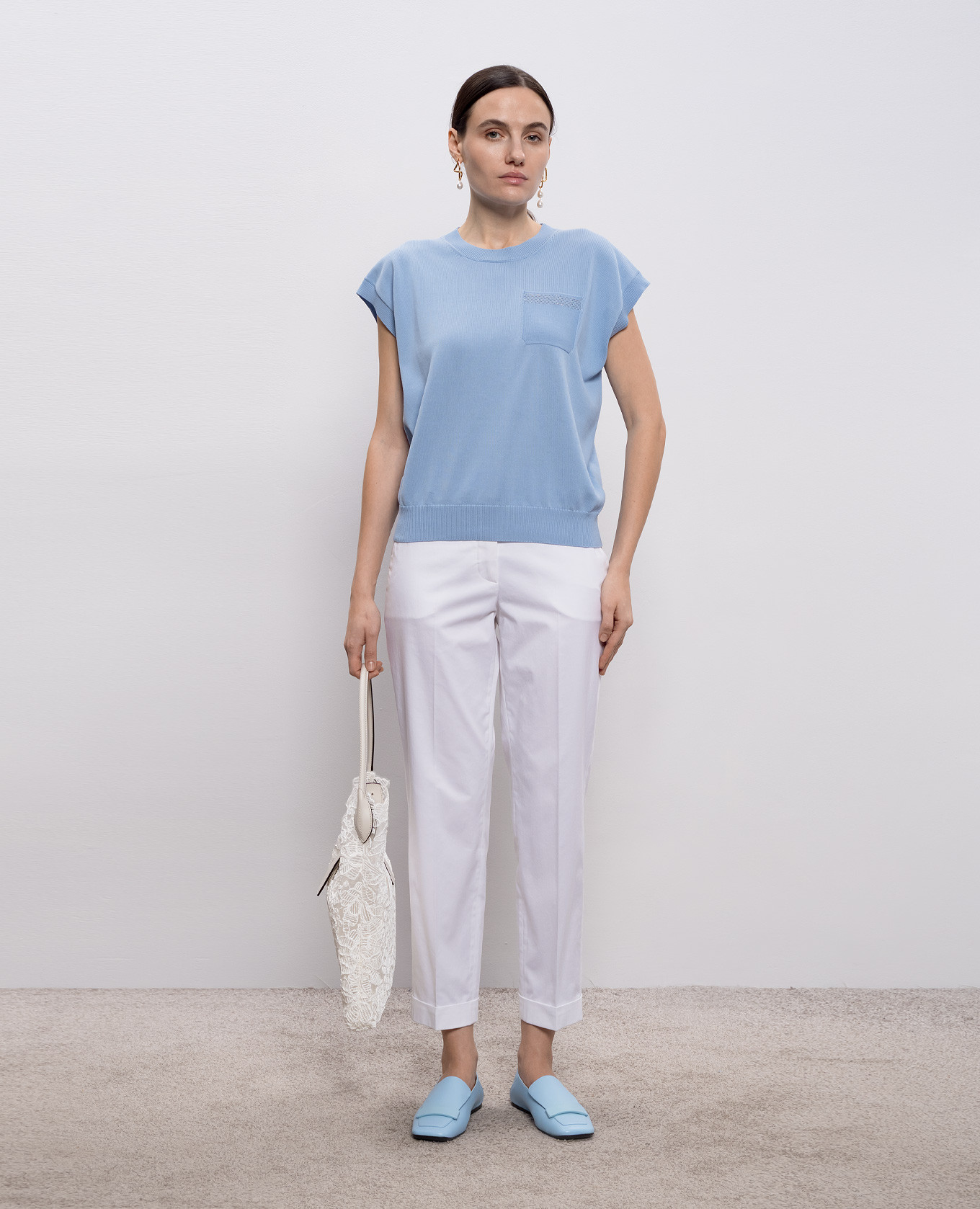 

White pants with brand patch Peserico