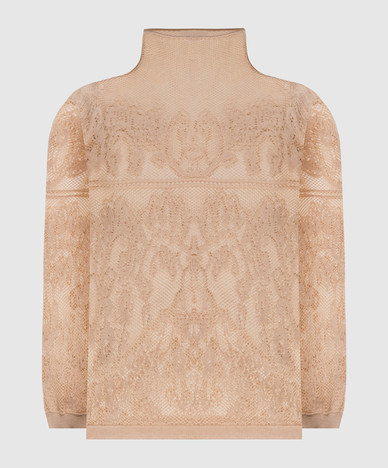 Haut beige à motifs
