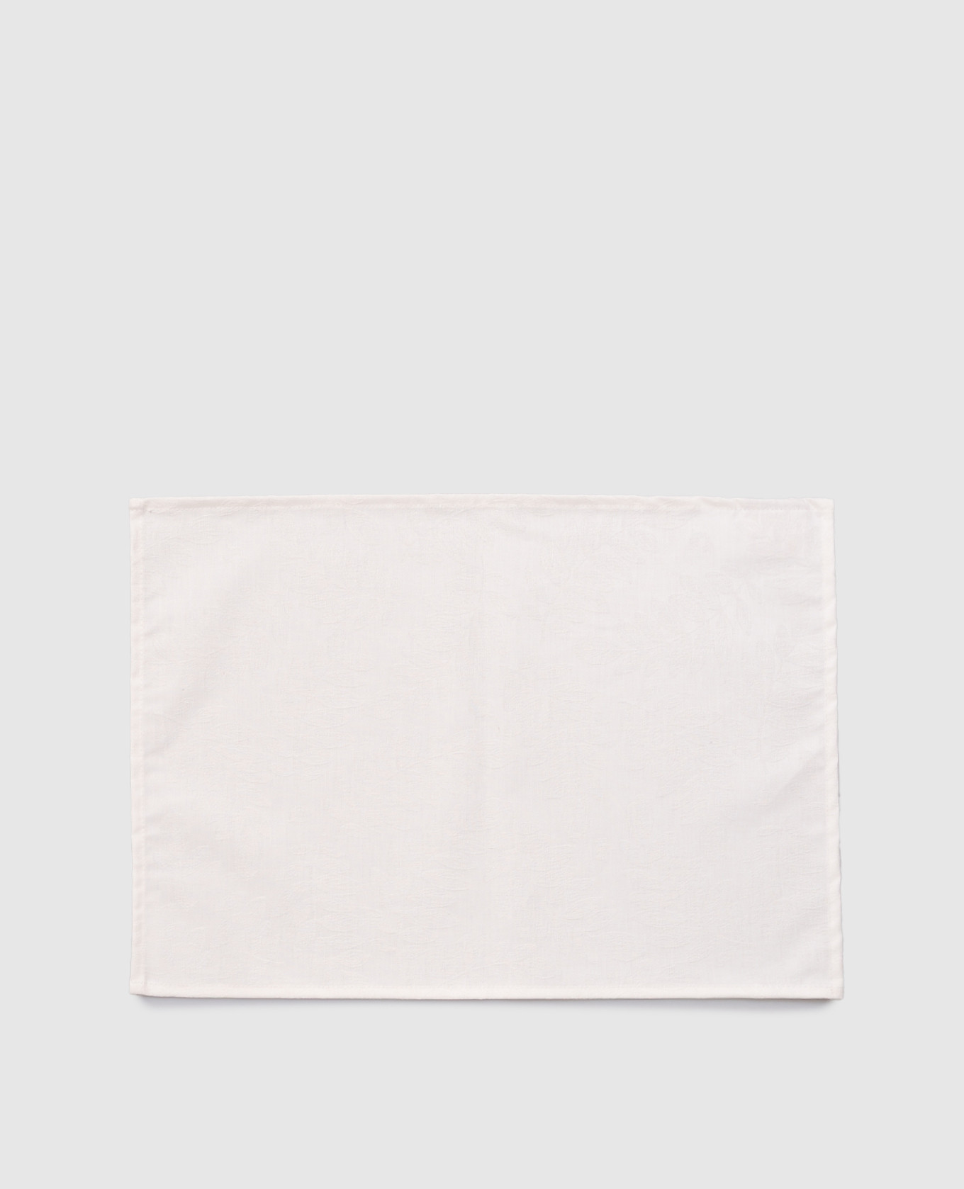 Witte placemat met plantaardige sfeer