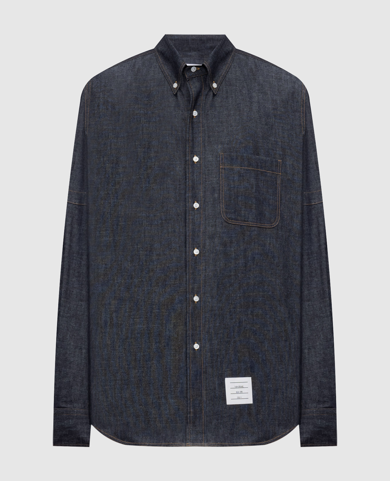 Blue denim shirt with a patch