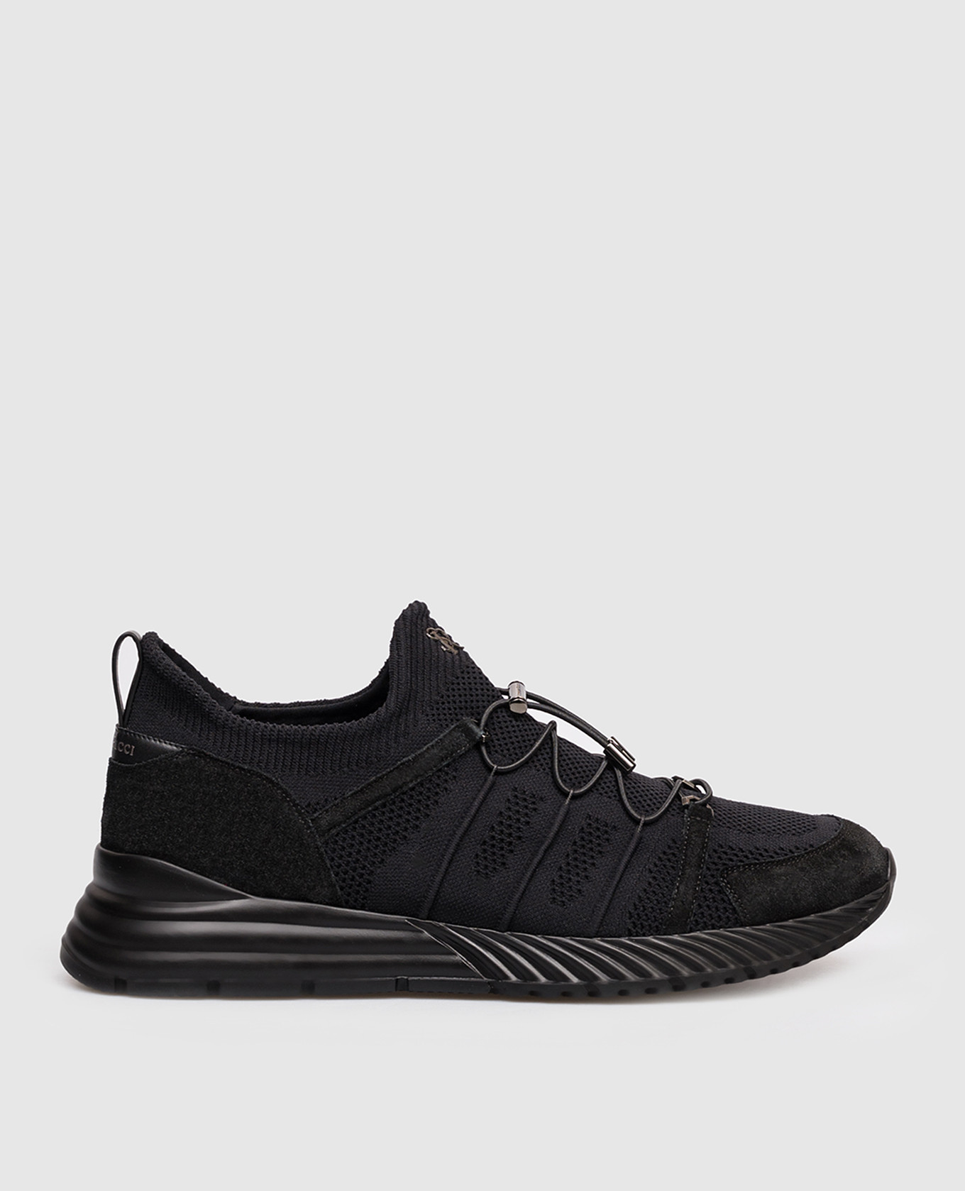 Black sneakers with monogram