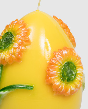 Cereria Introna Yellow egg-shaped candle with gerbera 1143