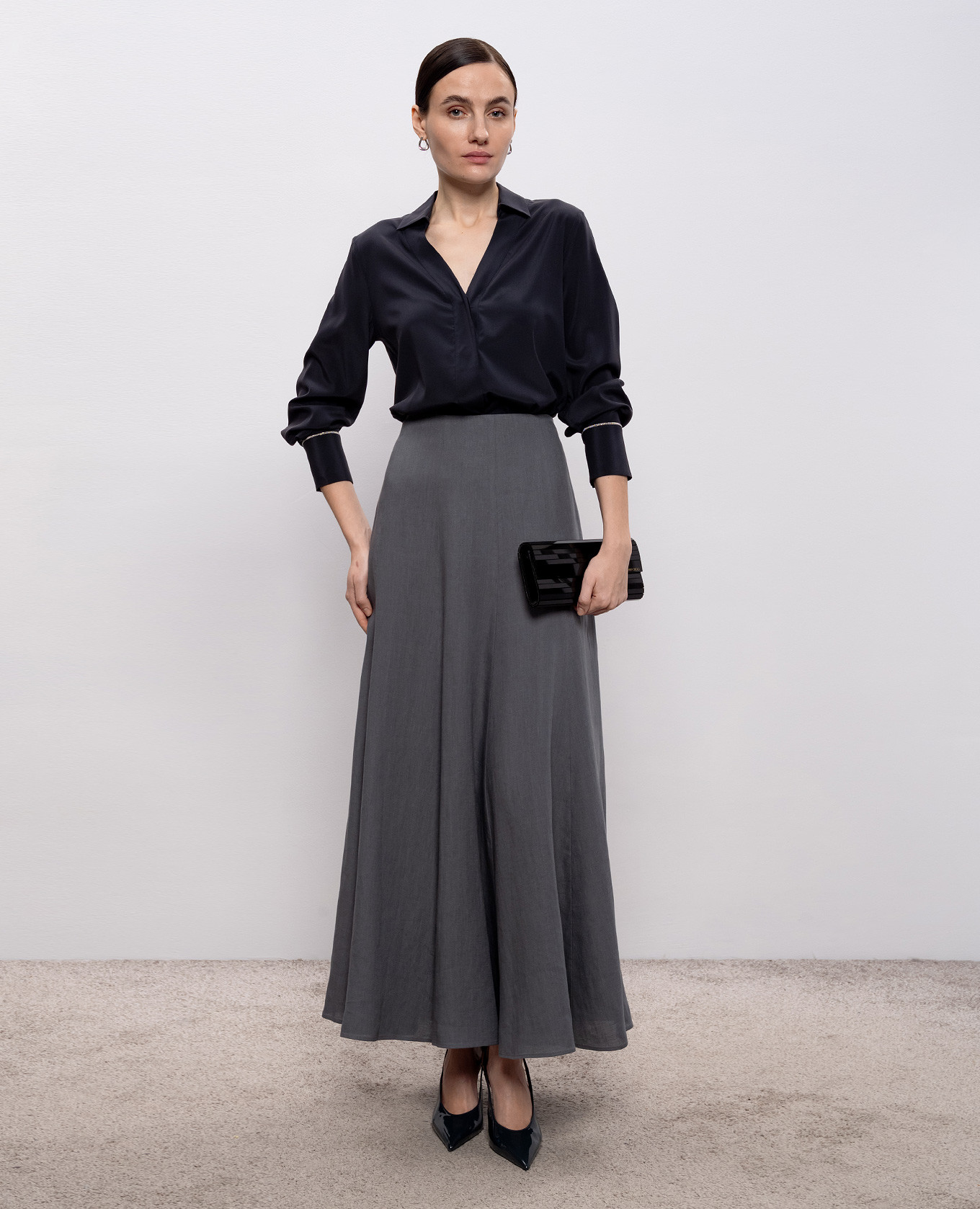 

Blue silk blouse with monil chain Peserico