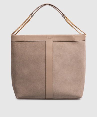 Beige suede bag with embossed logo