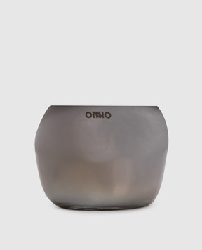 Onno Cape Smoked Grey M candle with Muse scent in a glass candle holder ON509M