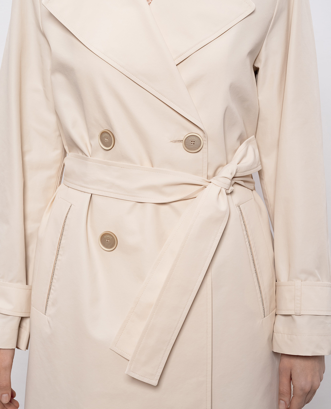 

Beige trench coat with monil chain Peserico