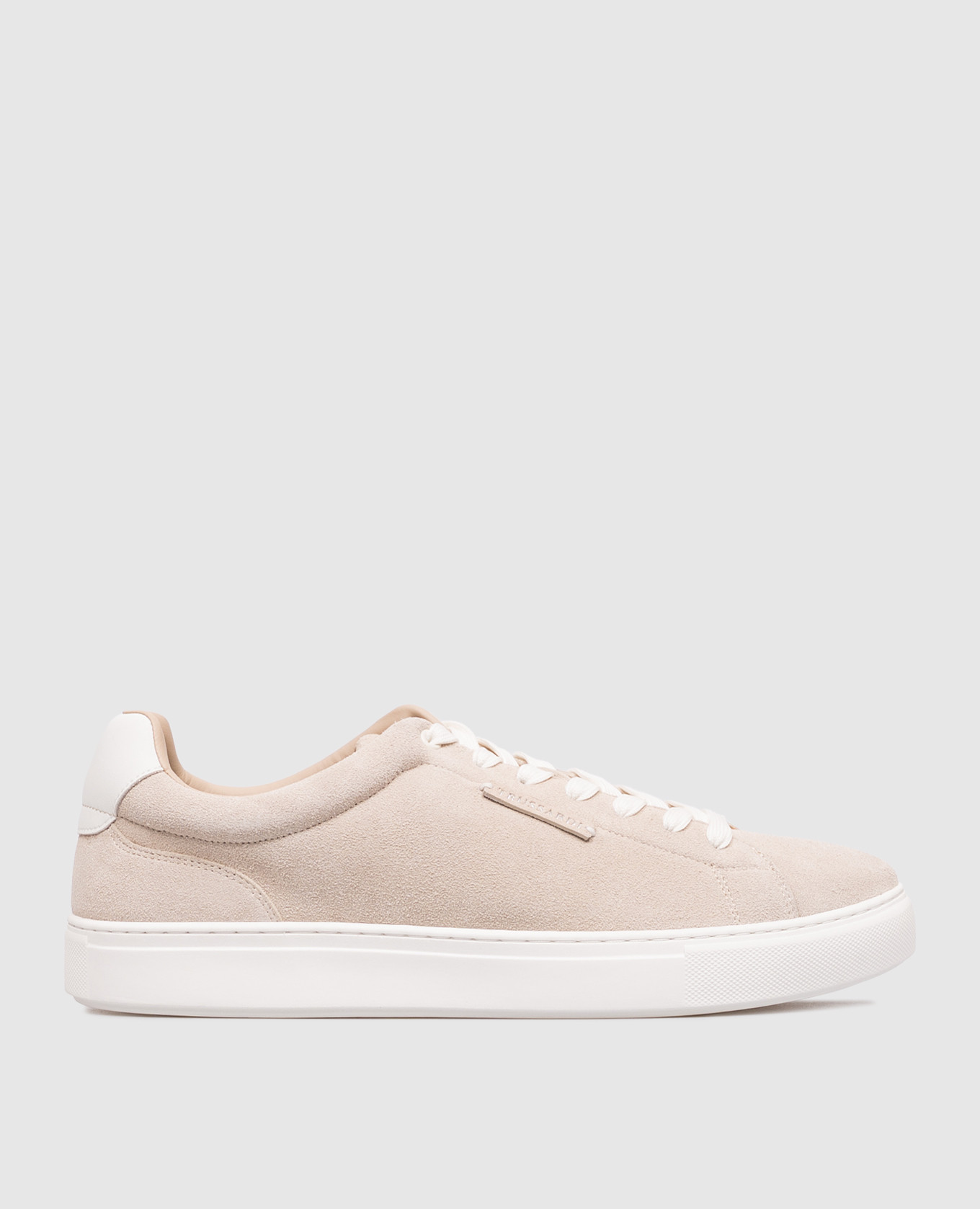 Beige suede sneakers with logo