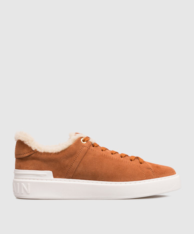 Brown suede sneakers with fur