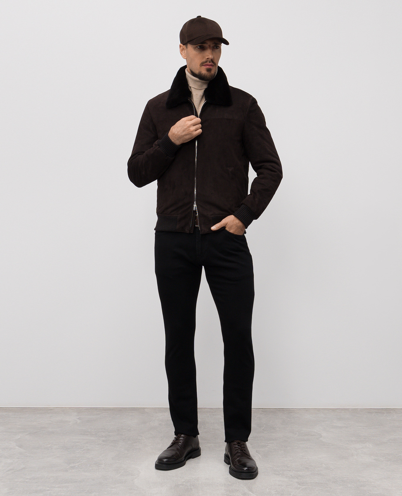 

Black jeans with logo patch Enrico Mandelli