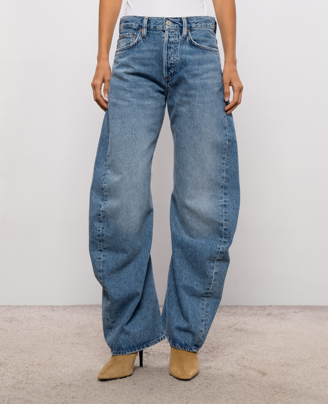 Blue jeans with a worn effect AGOLDE 3