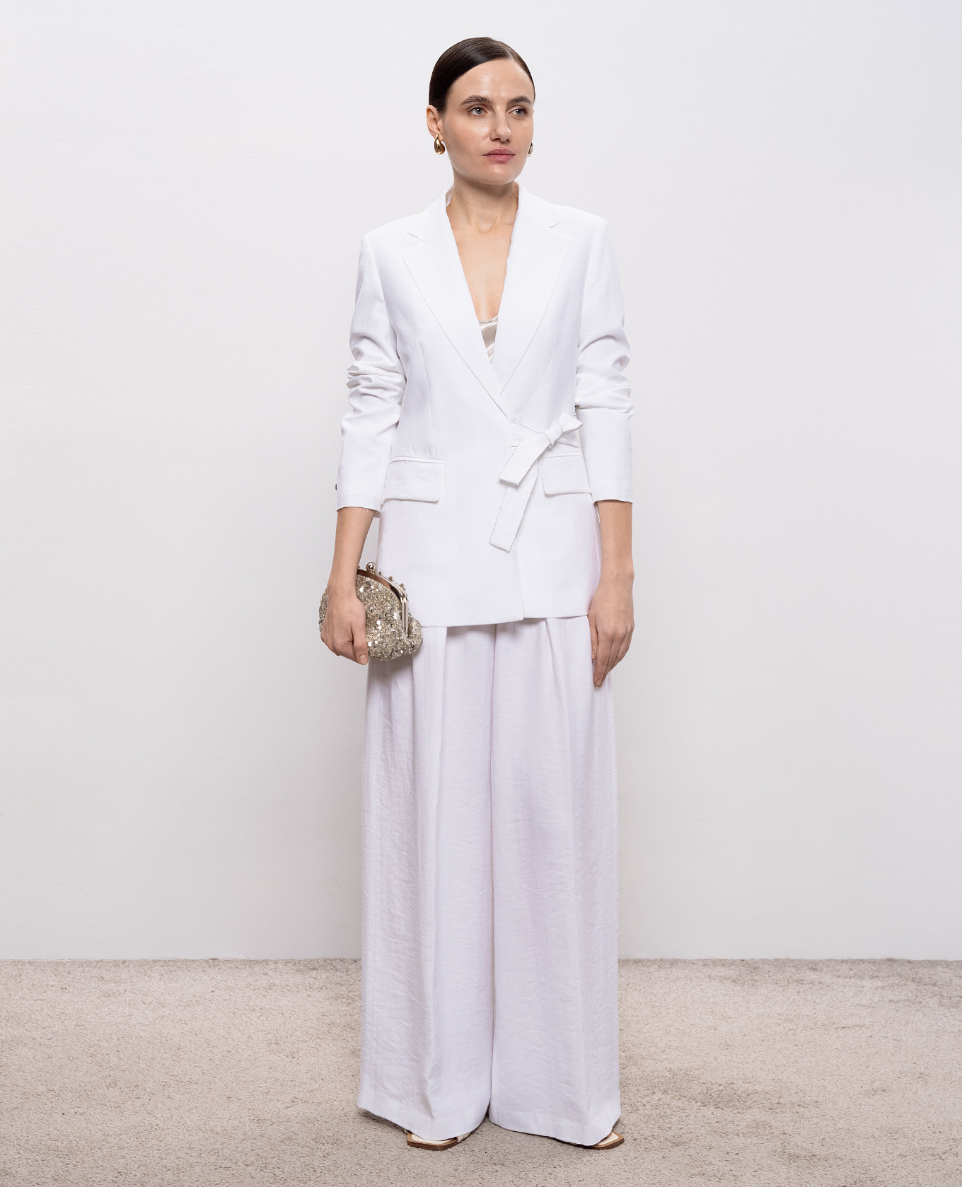 

White palazzos with linen Peserico