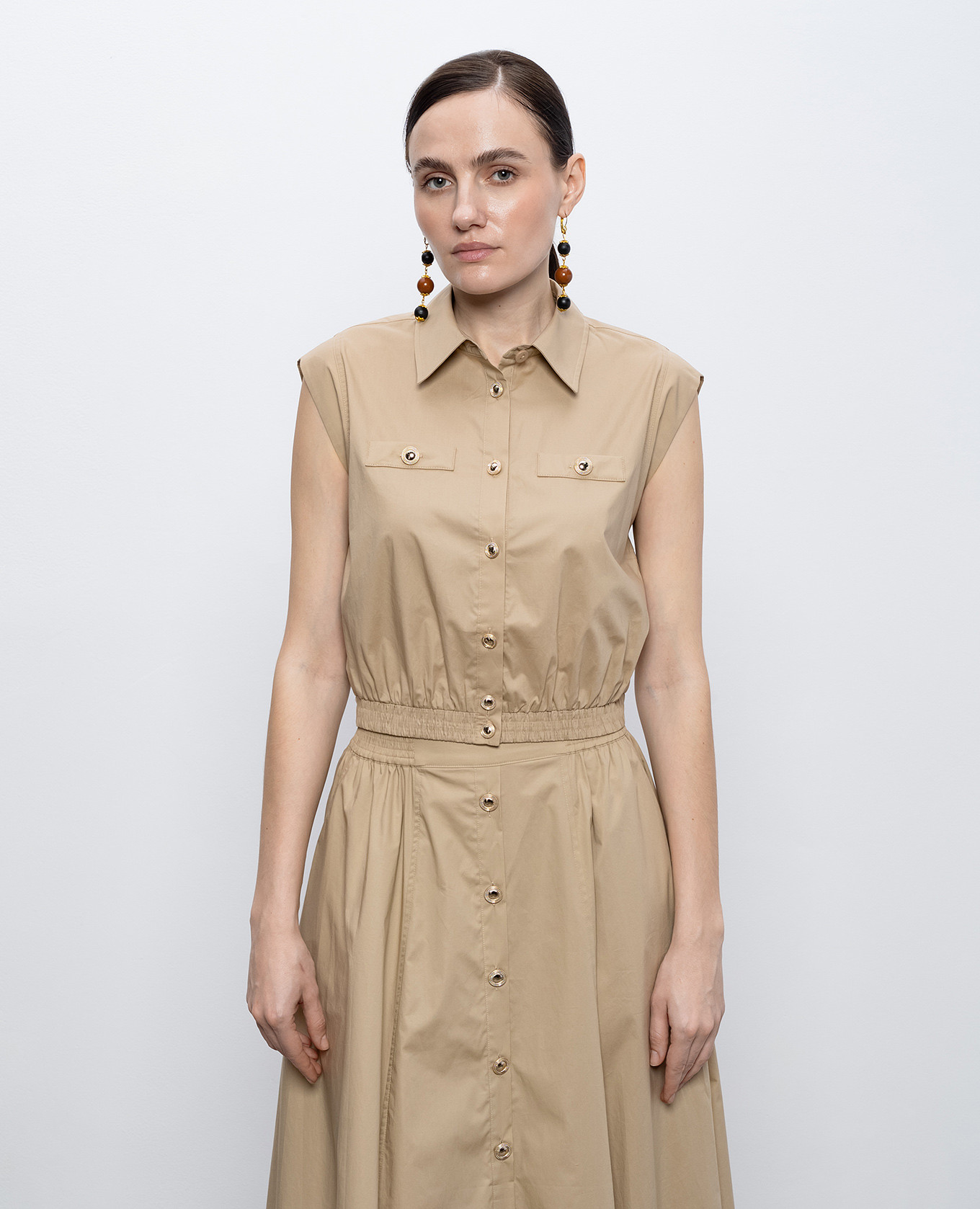 

Beige cropped sleeveless shirt Twinset