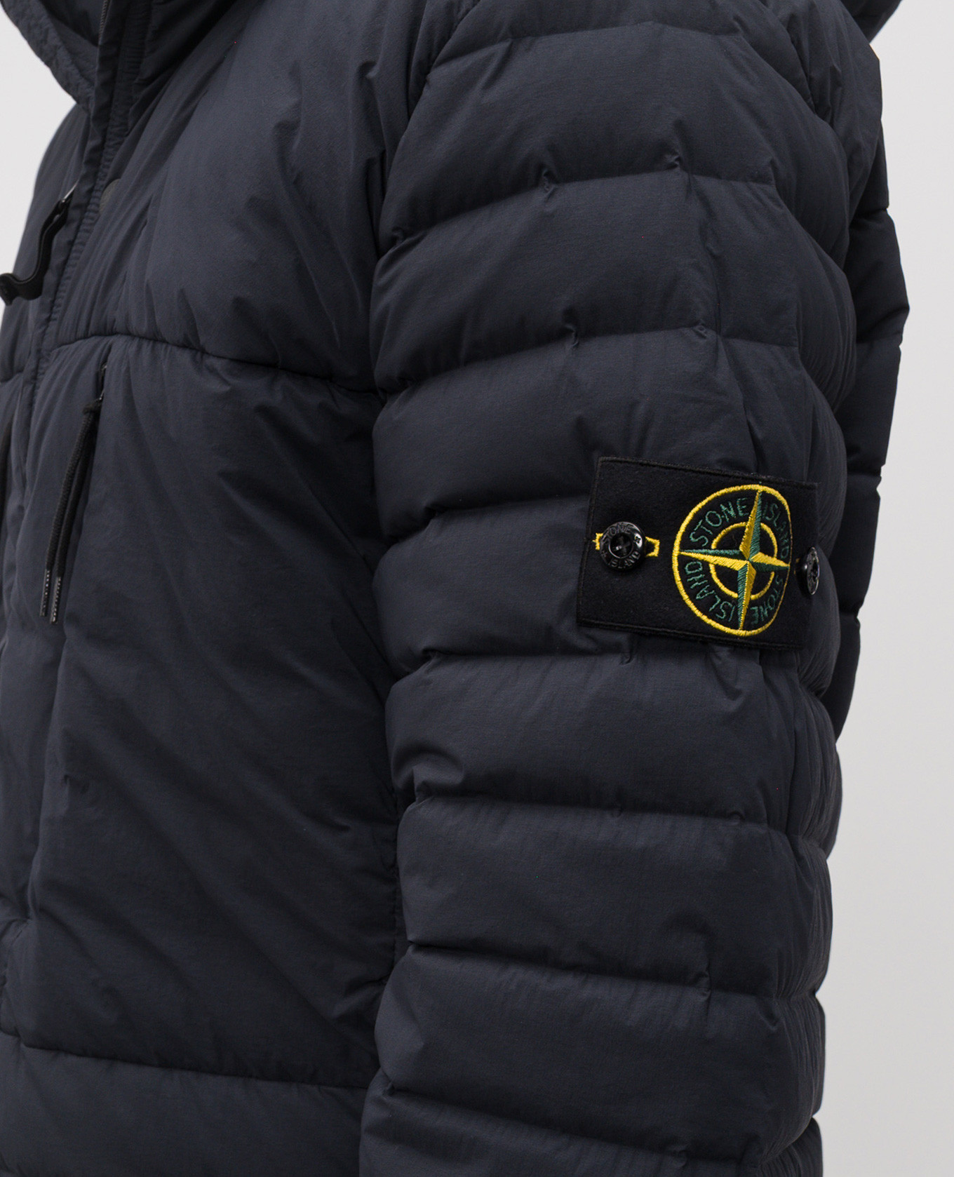 

Blue down jacket with logo Stone Island