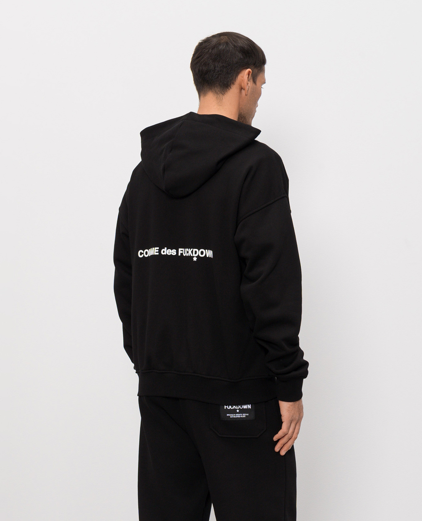 

Black sports jacket with logo print Comme des Fuckdown