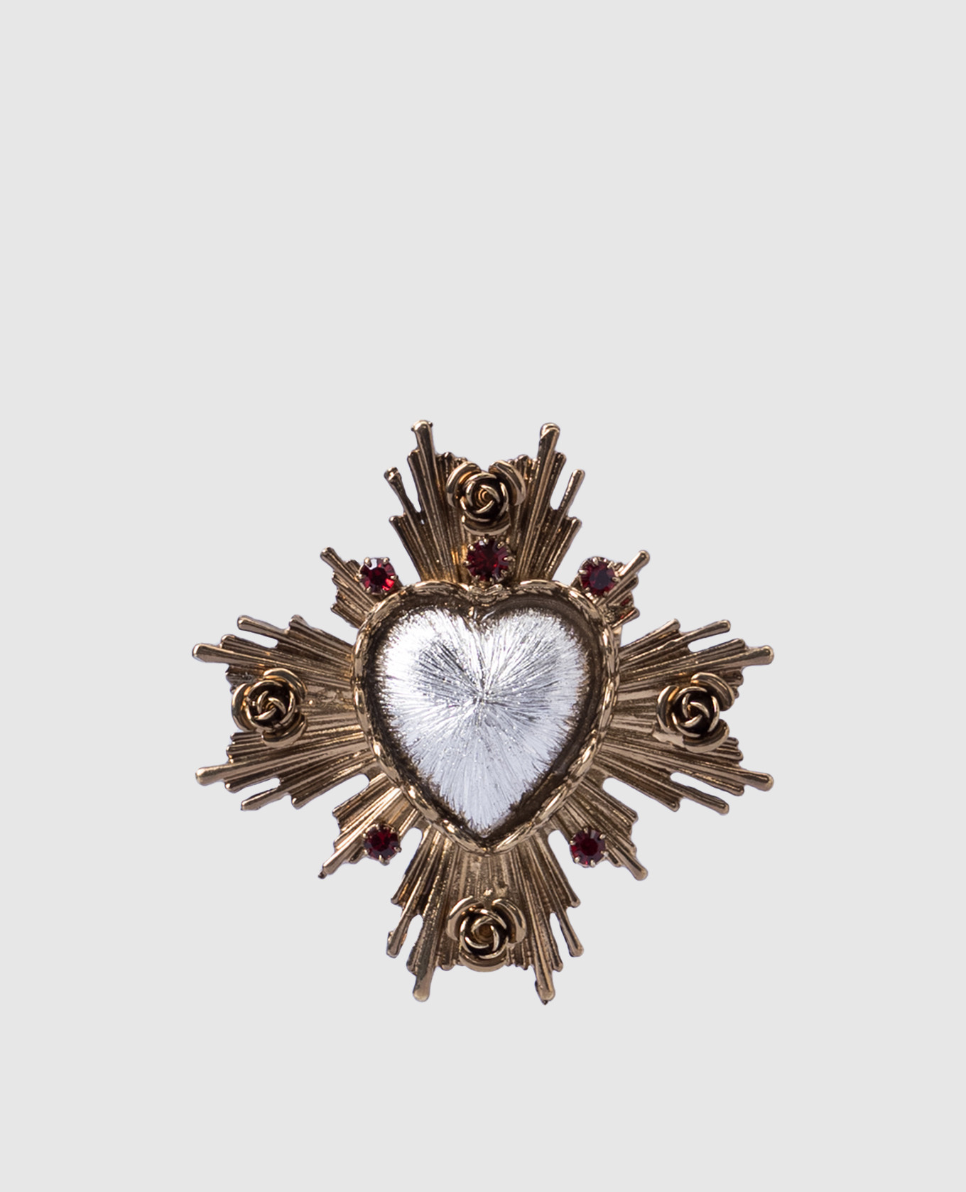 Gold-tone heart-shaped brooch with crystals