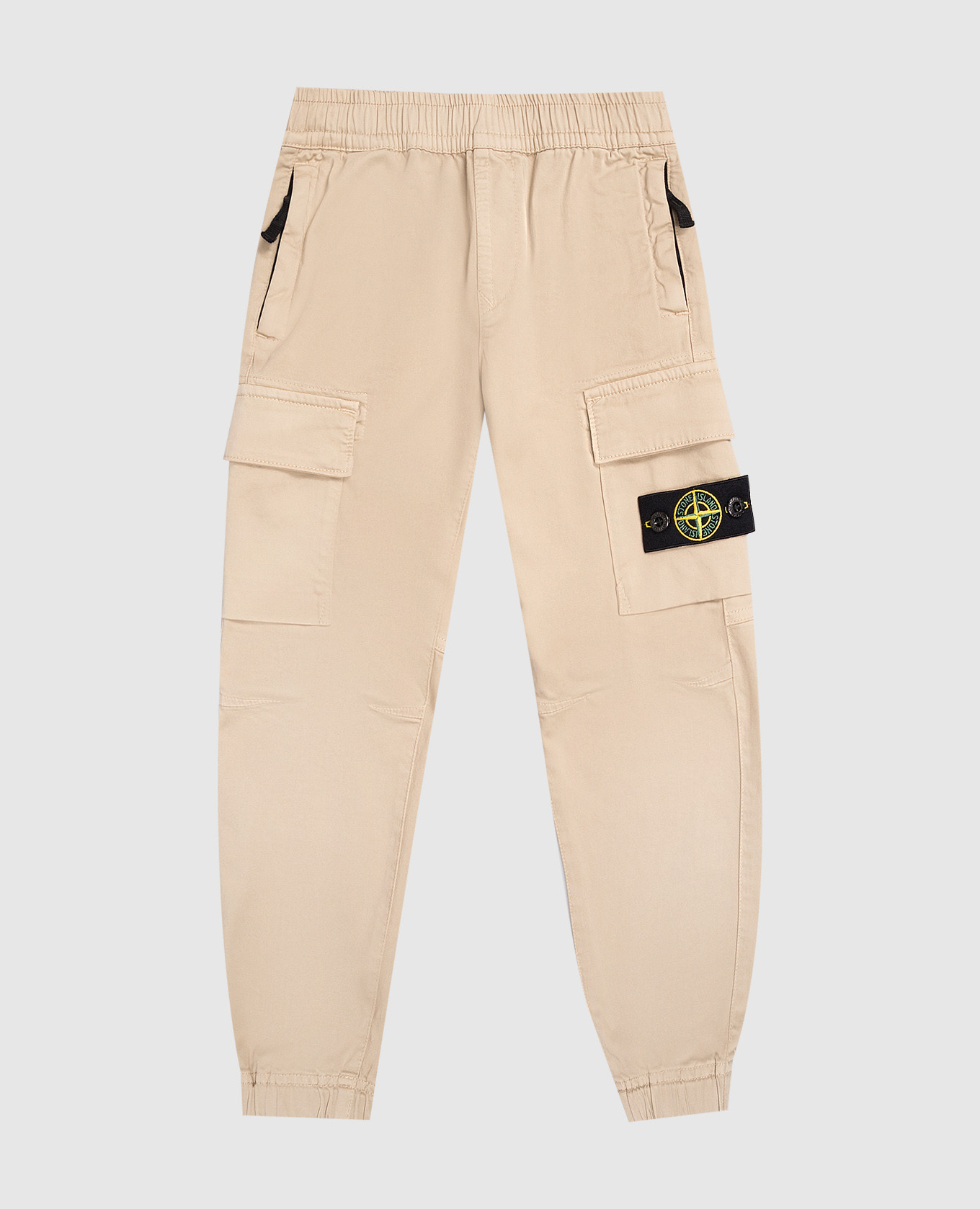 

Children's beige joggers with logo Stone Island