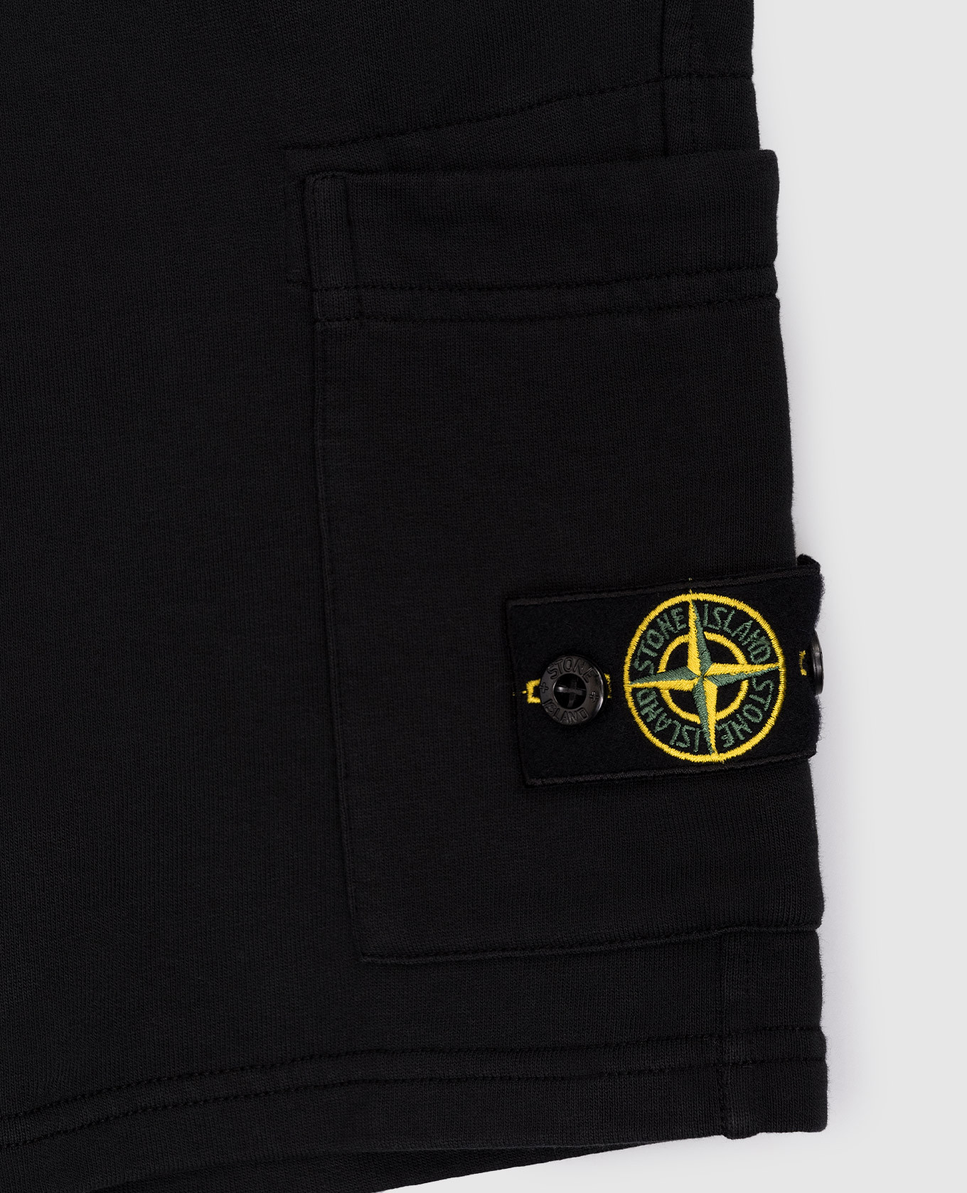 

Children's black shorts with logo Stone Island