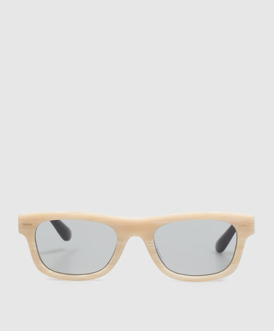 Beige sunglasses with logo engraving