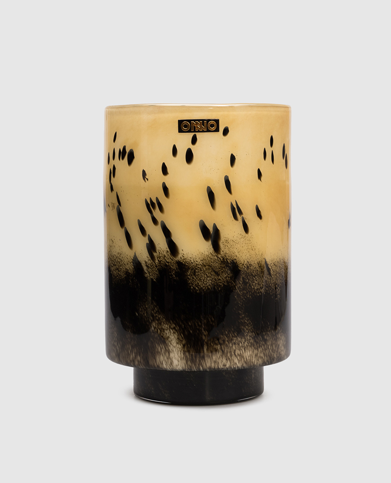 

Art Brigitte  candle with Zanzibar scent in a glass candle holder Onno, Beige