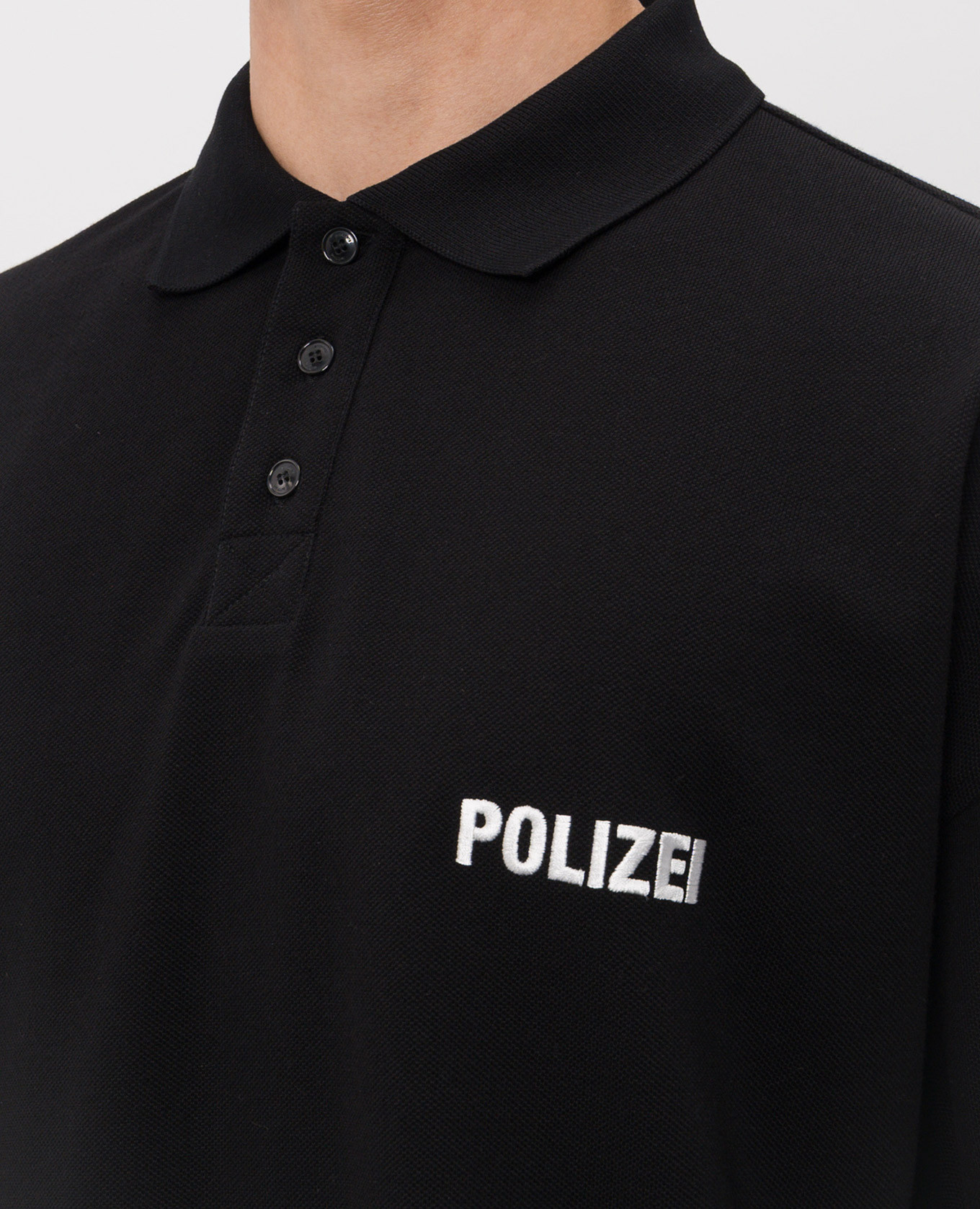 

Black polo shirt with embroidery Vetements