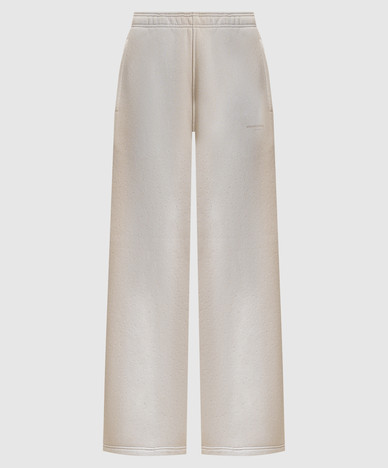 Beige insulated sweatpants with a distressed effect