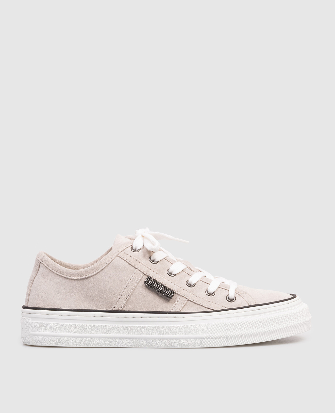 Gray suede sneakers with a monil chain