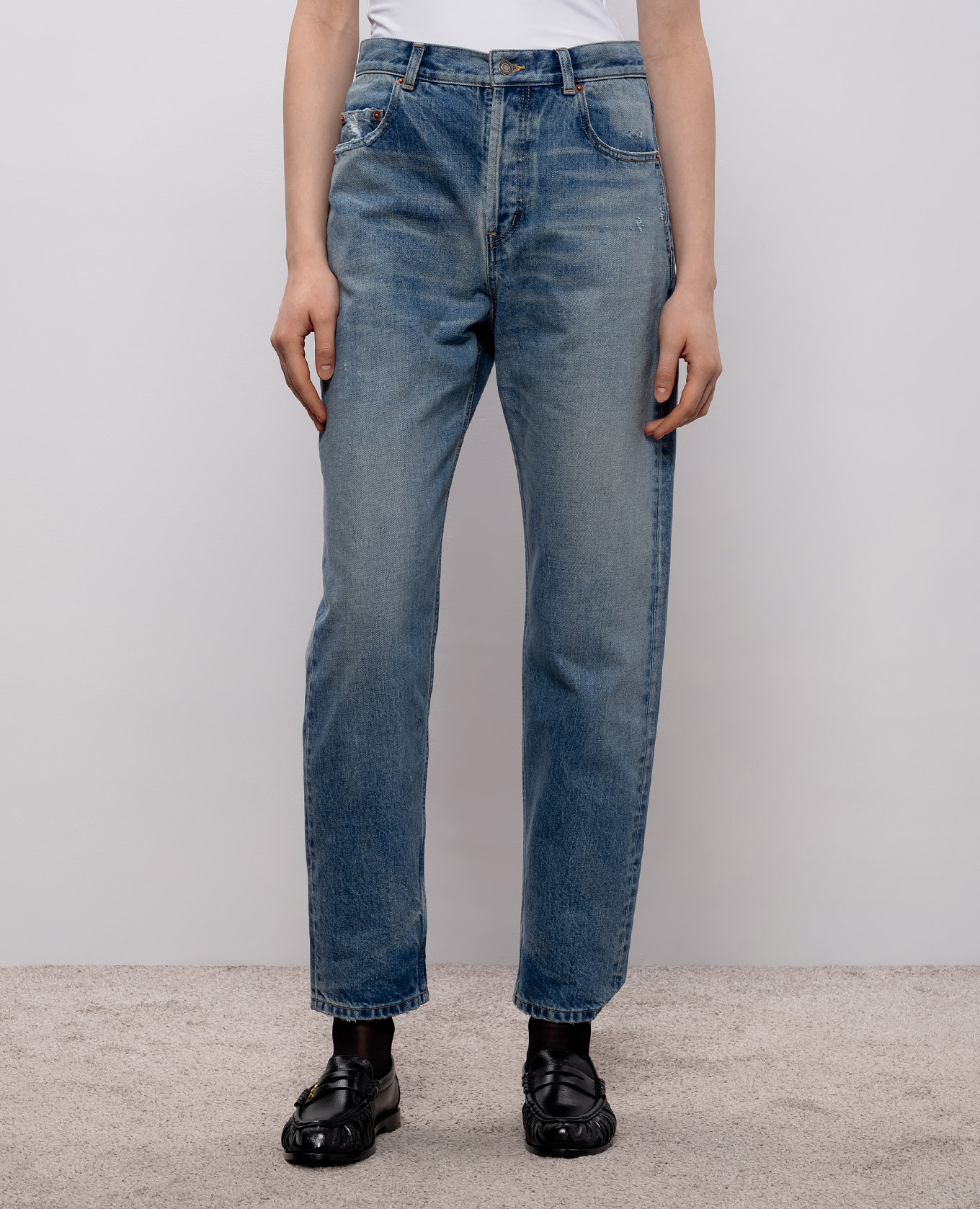 

Blue jeans with a worn effect Saint Laurent