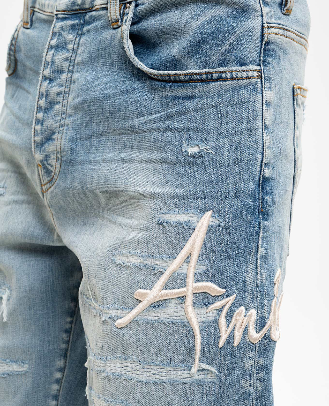 Blue jeans with holes AMIRI 5
