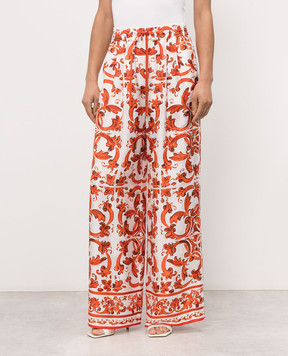 Dolce&Gabbana White silk pants with branded print FTDBNTGDDRE