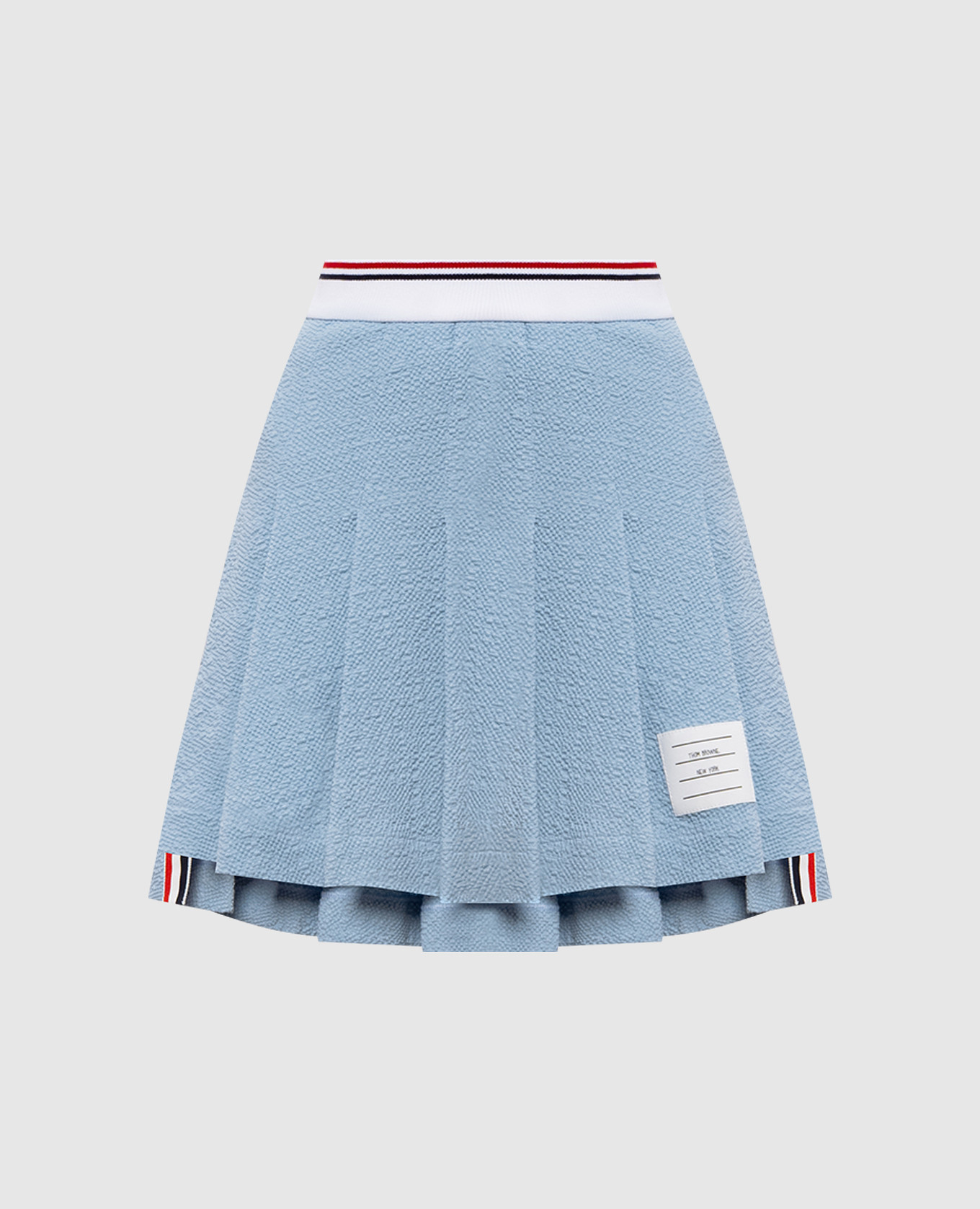 Blue pleated skirt with logo patch