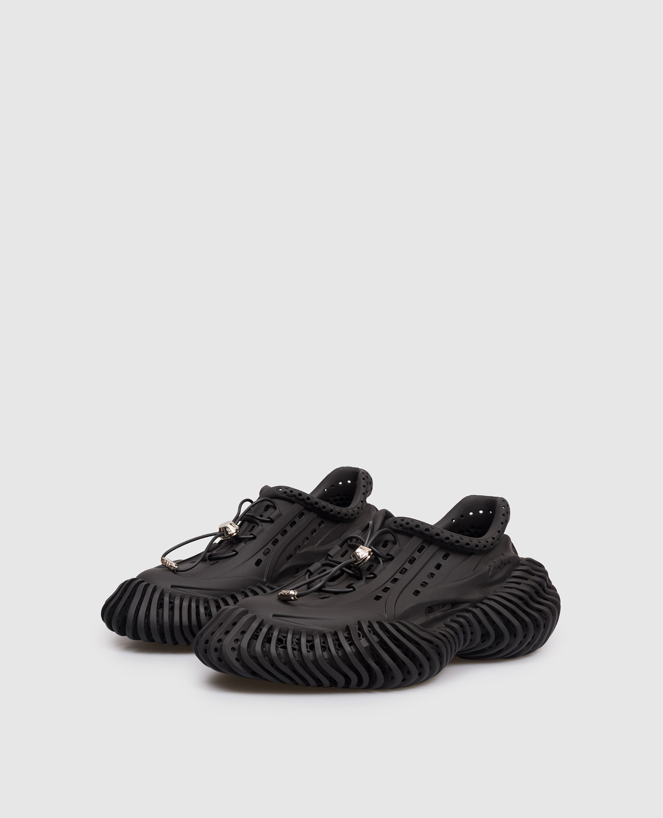 

Black sneakers with textured logo 2AM