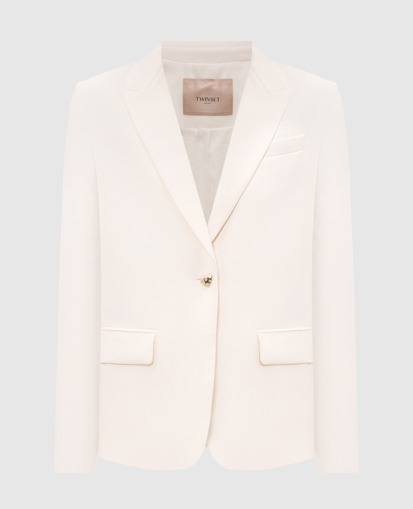 Ivory jacket with metal logo